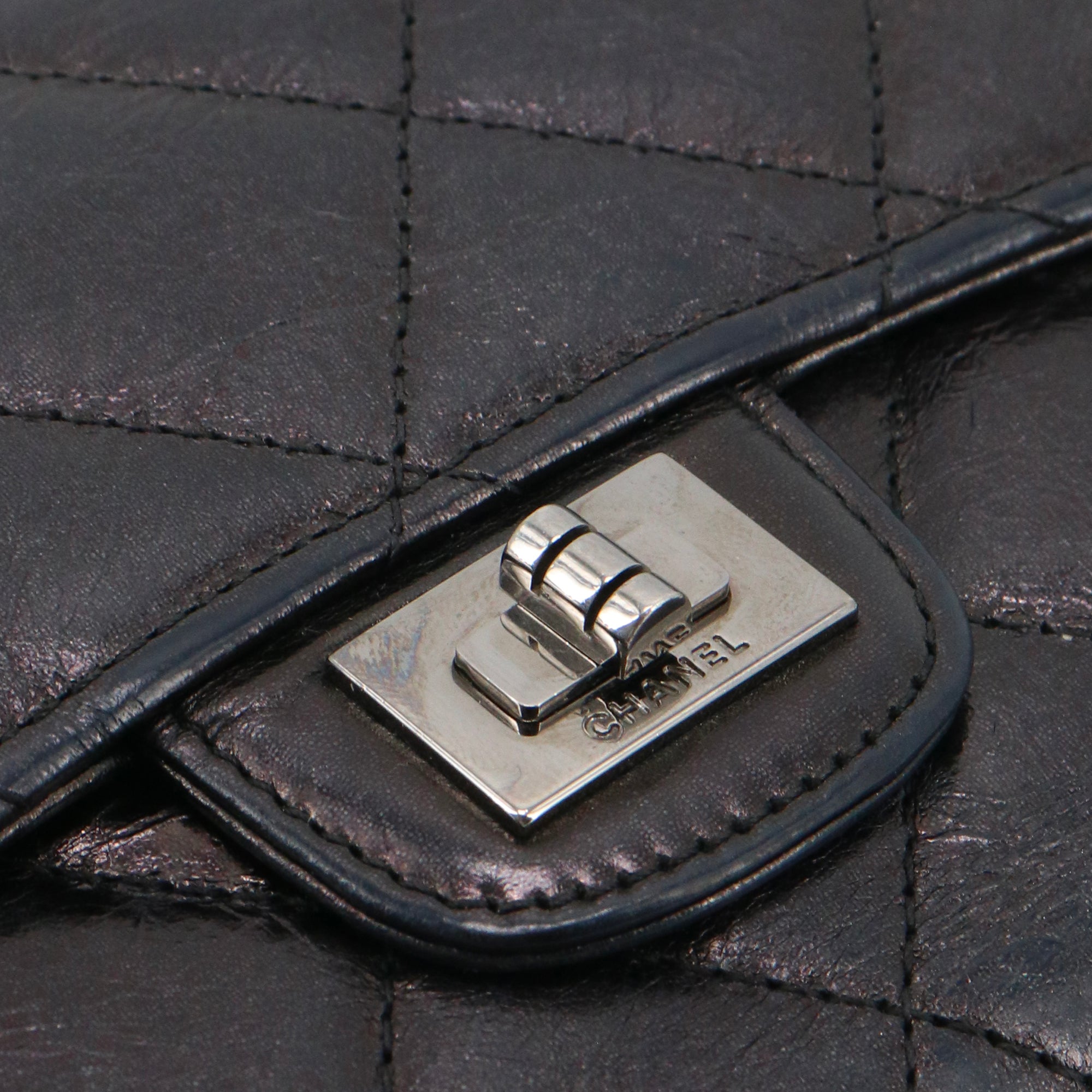 CHANEL - Black quilted leather wallet