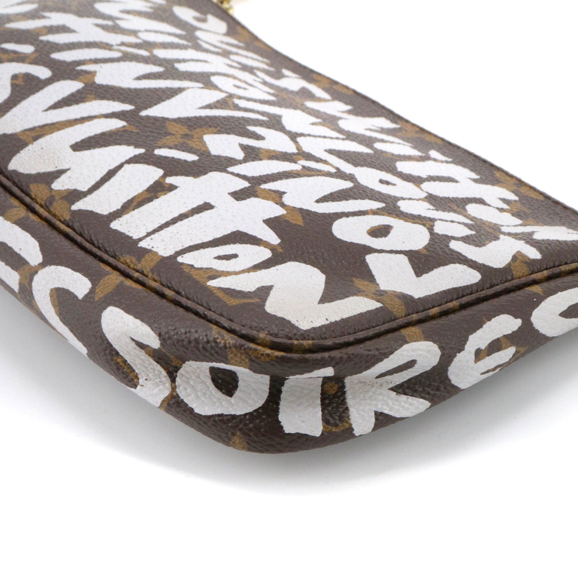 LOUIS VUITTON - Louis Vuitton x Stephen Sprouse Accessories Pouch in Graffiti Monogram Canvas