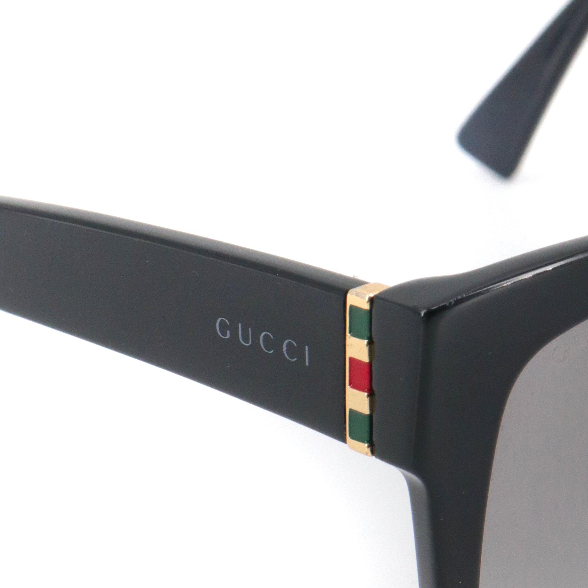 GUCCI - Lunettes de soleil Gucci en plastique noir