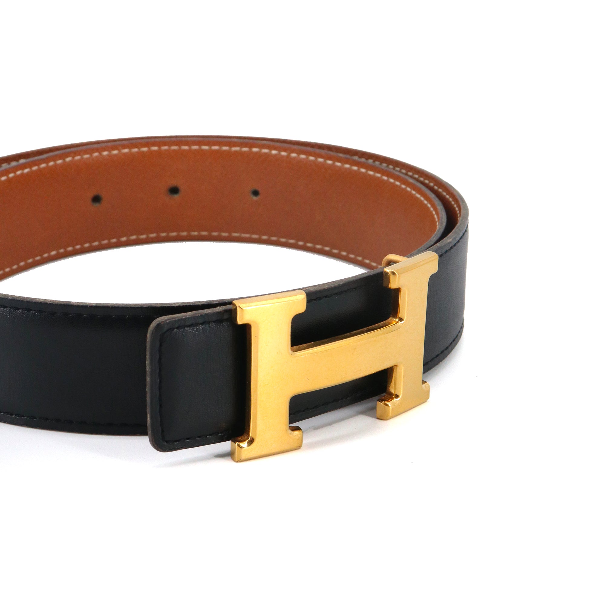 HERMÈS - Hermès reversible H belt in black and gold leather (T70)