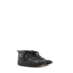 CHANEL - Sneakers montantes CC Chanel en cuir noir (T38.5)