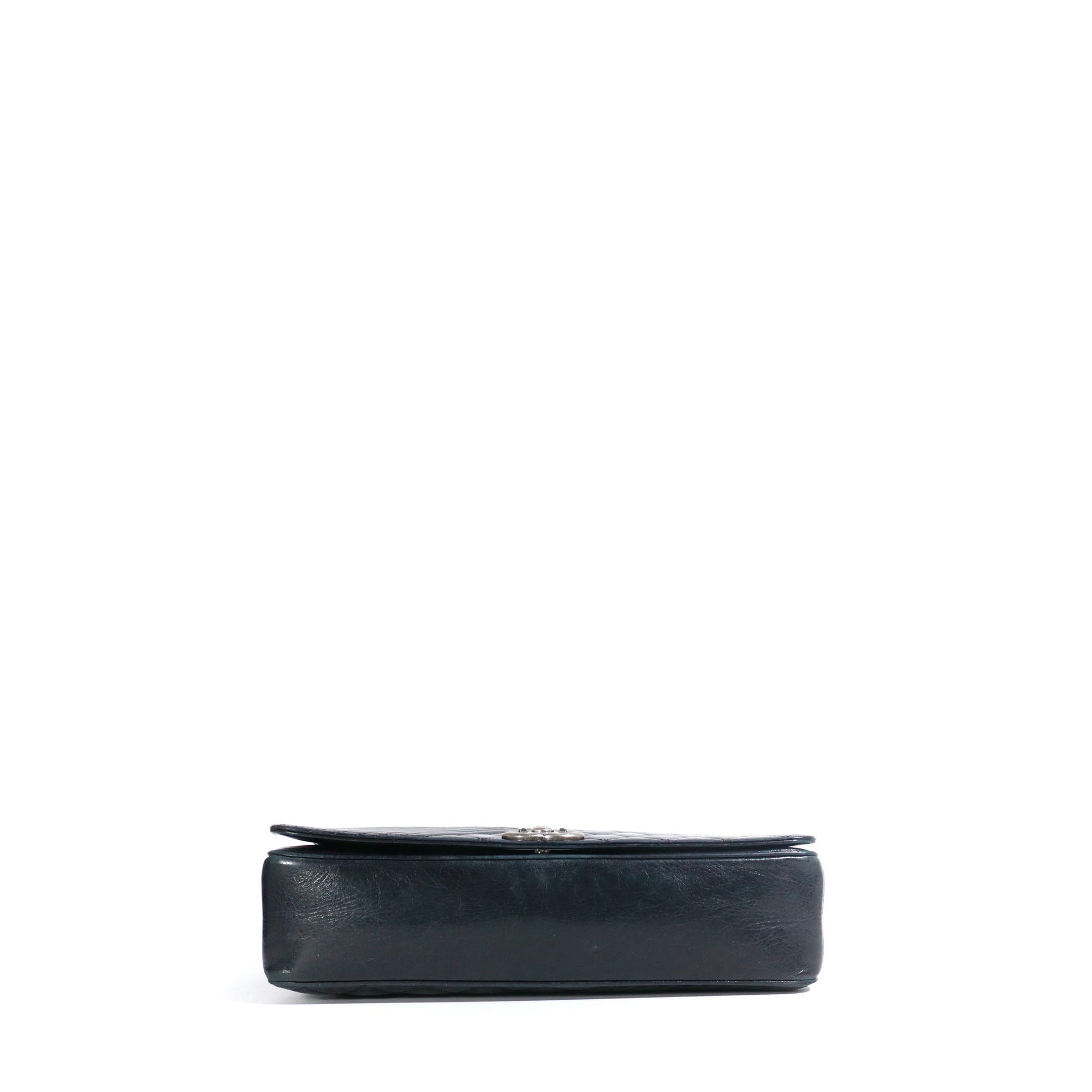 CHANEL - Coco Boy shoulder bag in black quilted leather