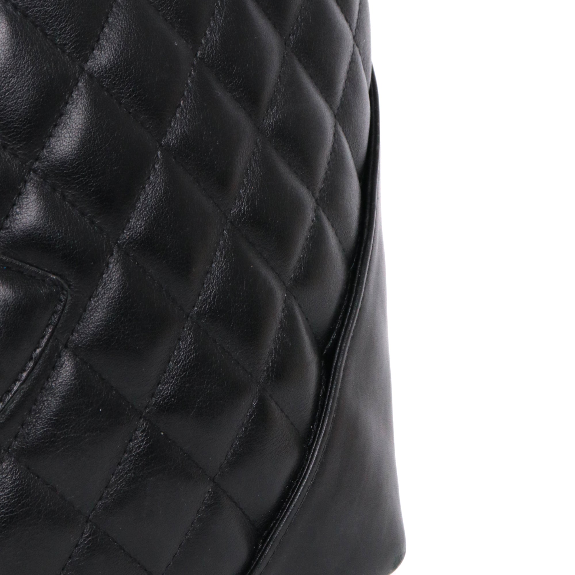 CHANEL - Cambon handbag in beige and black quilted leather
