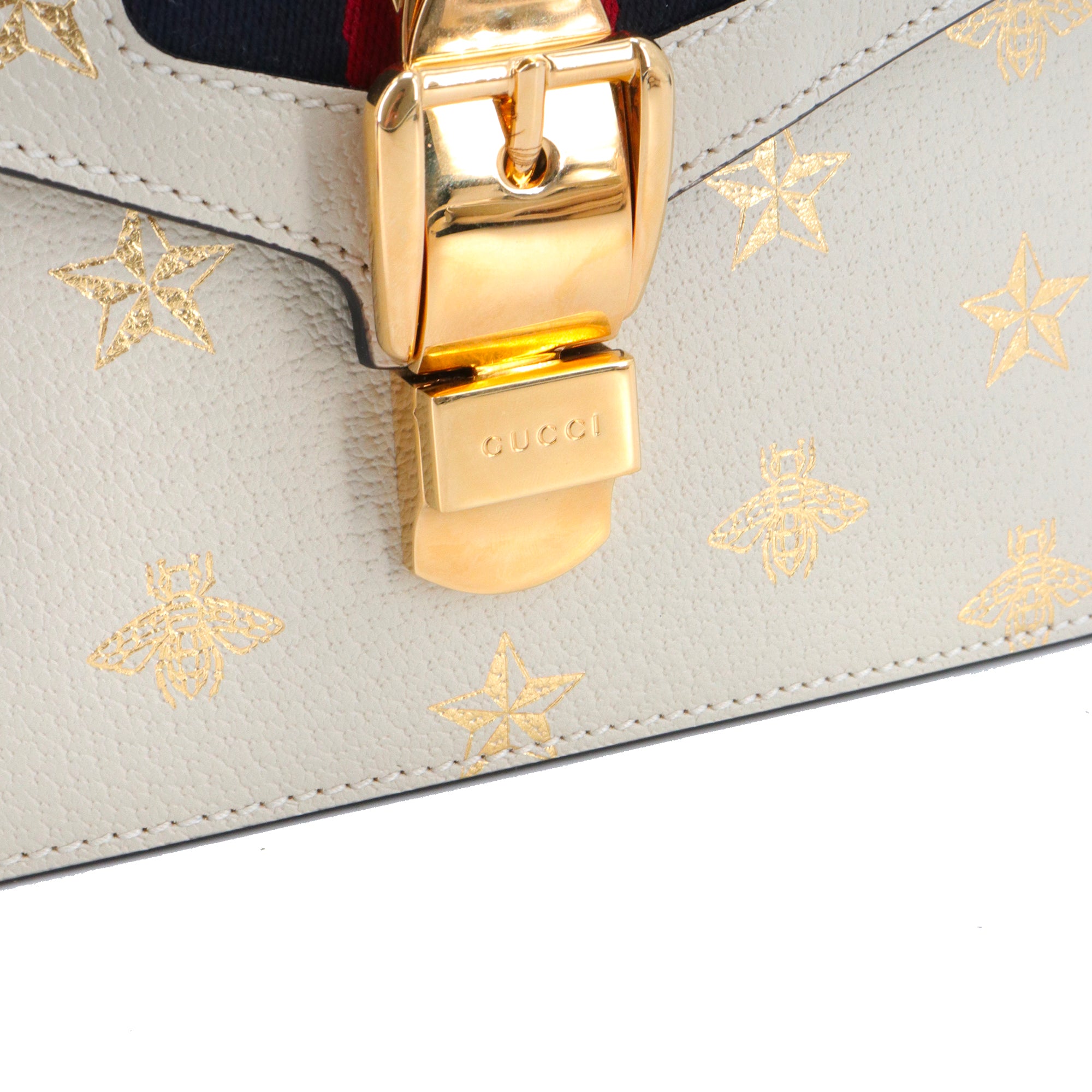 GUCCI - Sac à bandoulière Sylvie édition limitée Gucci en cuir grainé écru à motif
