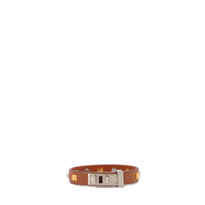 HERMÈS - Mini Dog Hermès bracelet in gold leather (T3)