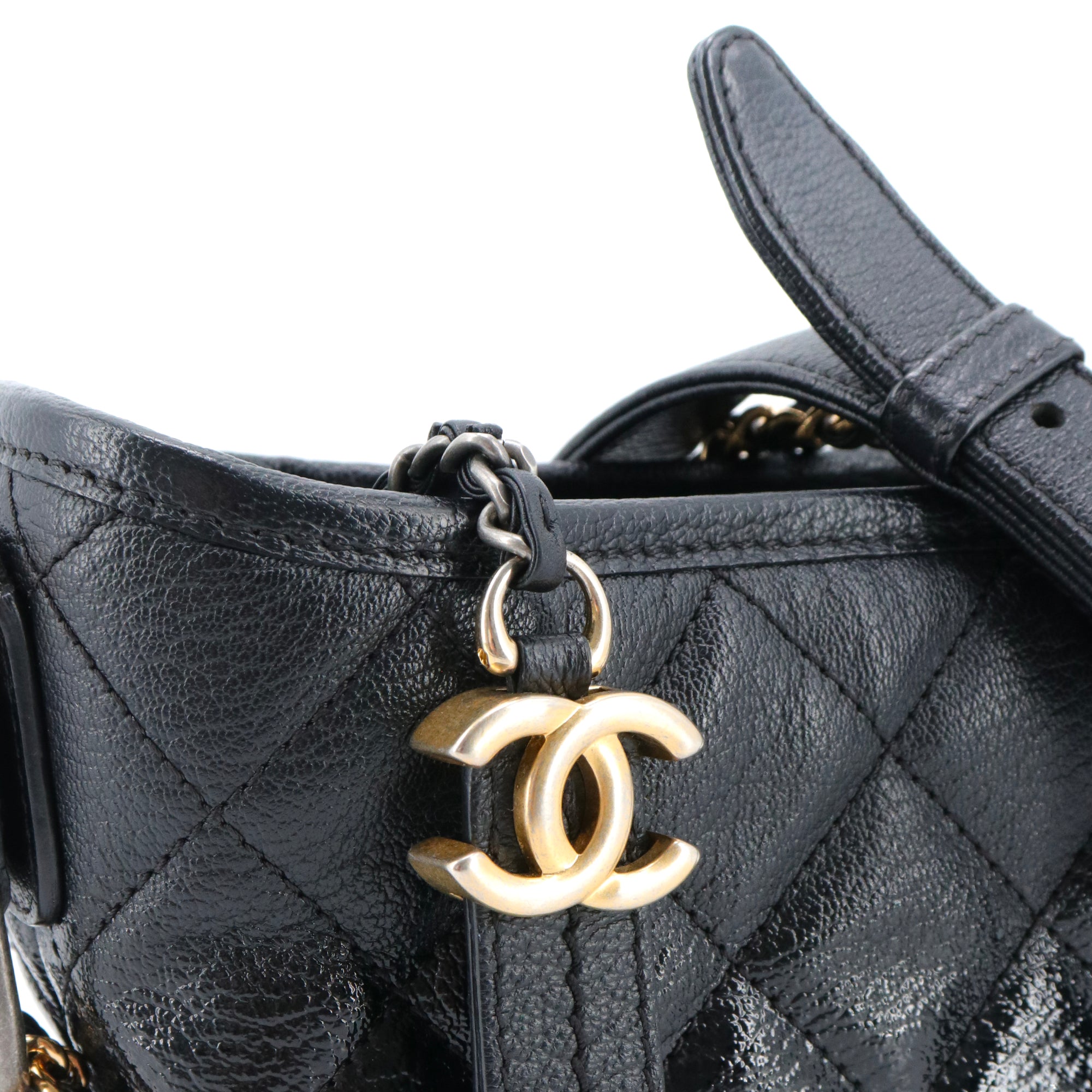 CHANEL - Chanel Gabrielle mini shoulder bag in black smooth and patent leather