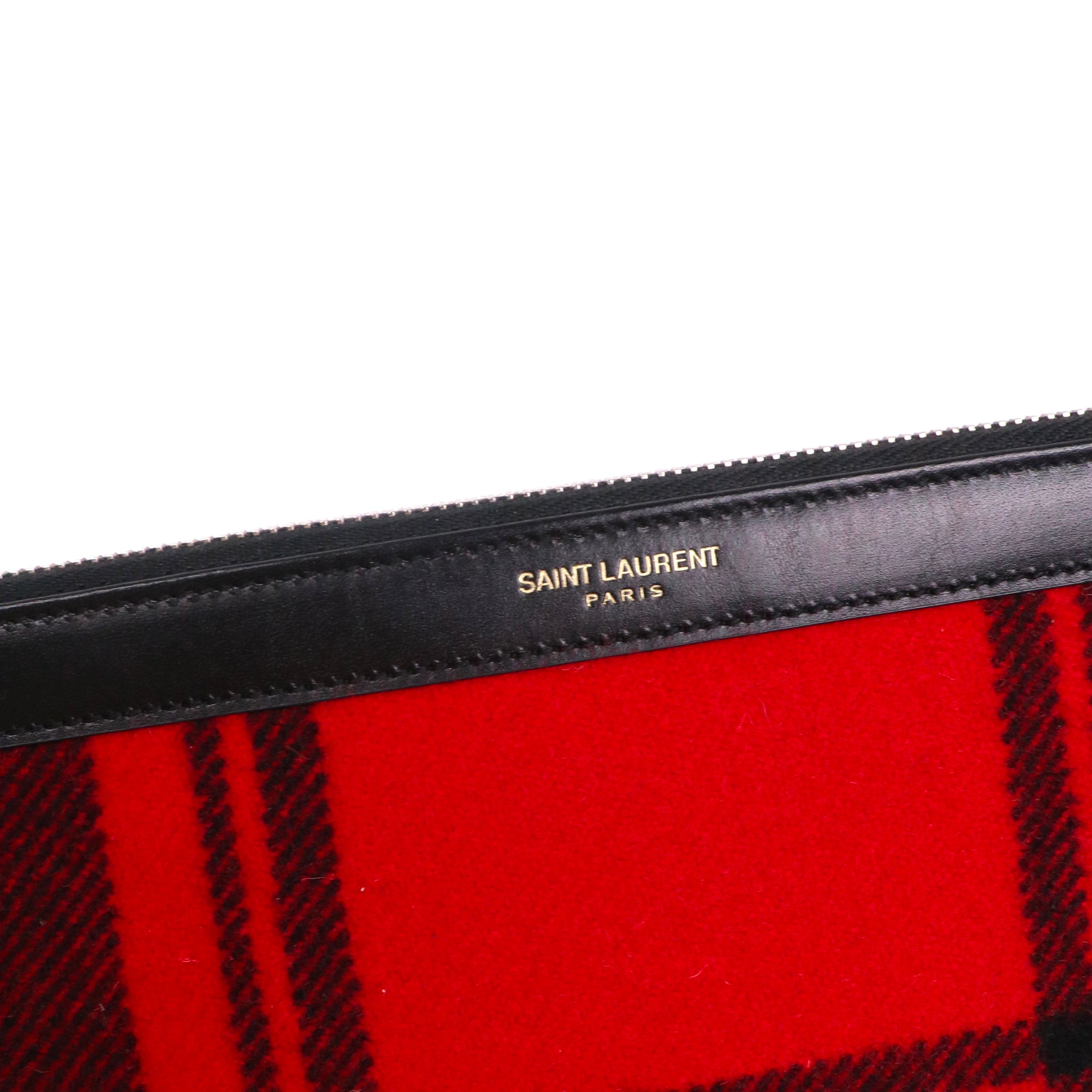 SAINT LAURENT - Saint Laurent Cassandre clutch in black chevron leather