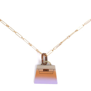HERMÈS - Kelly Hermès Fusion Amulet pendant in horn