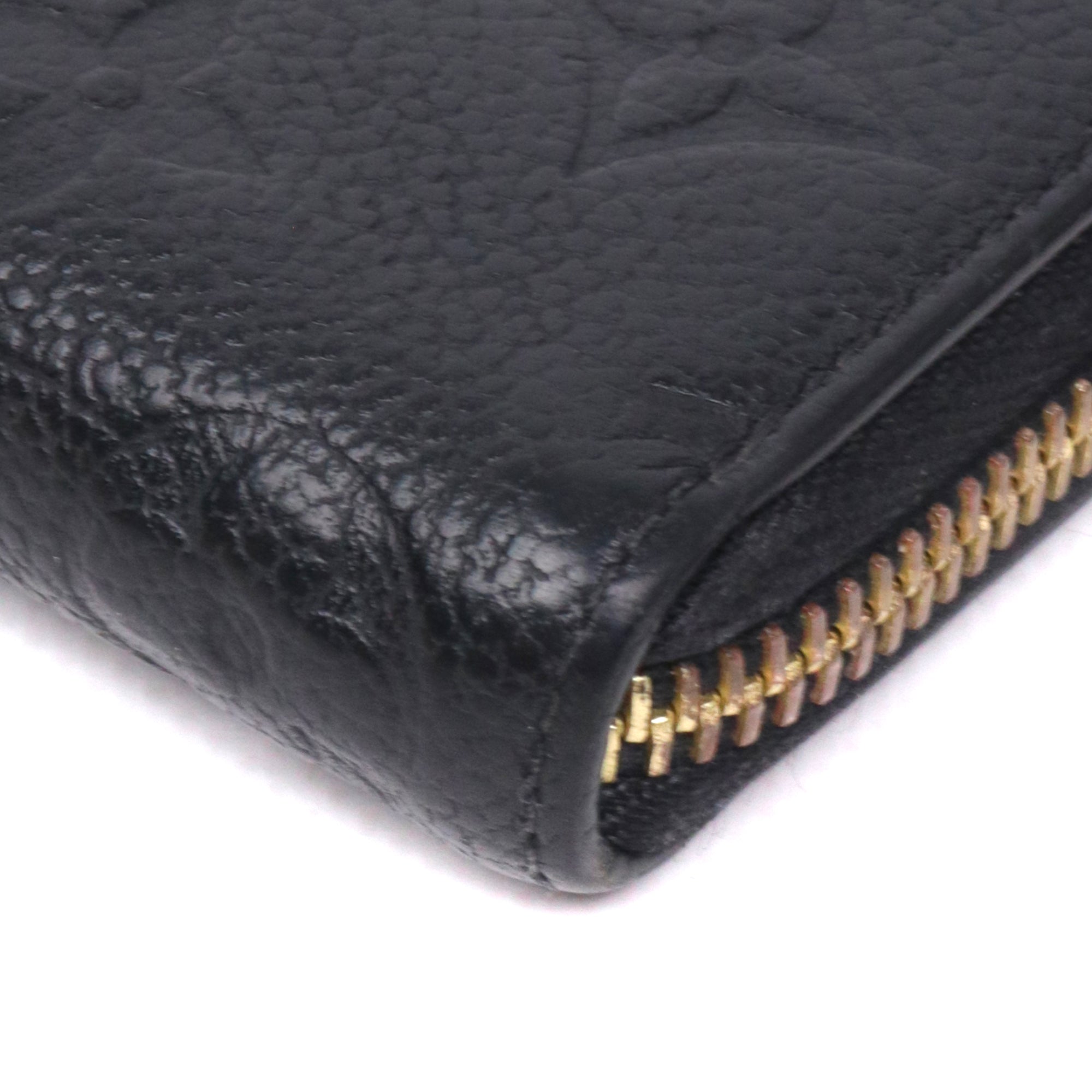 LOUIS VUITTON - Portefeuille Clémence Louis Vuitton en cuir empreinte noir