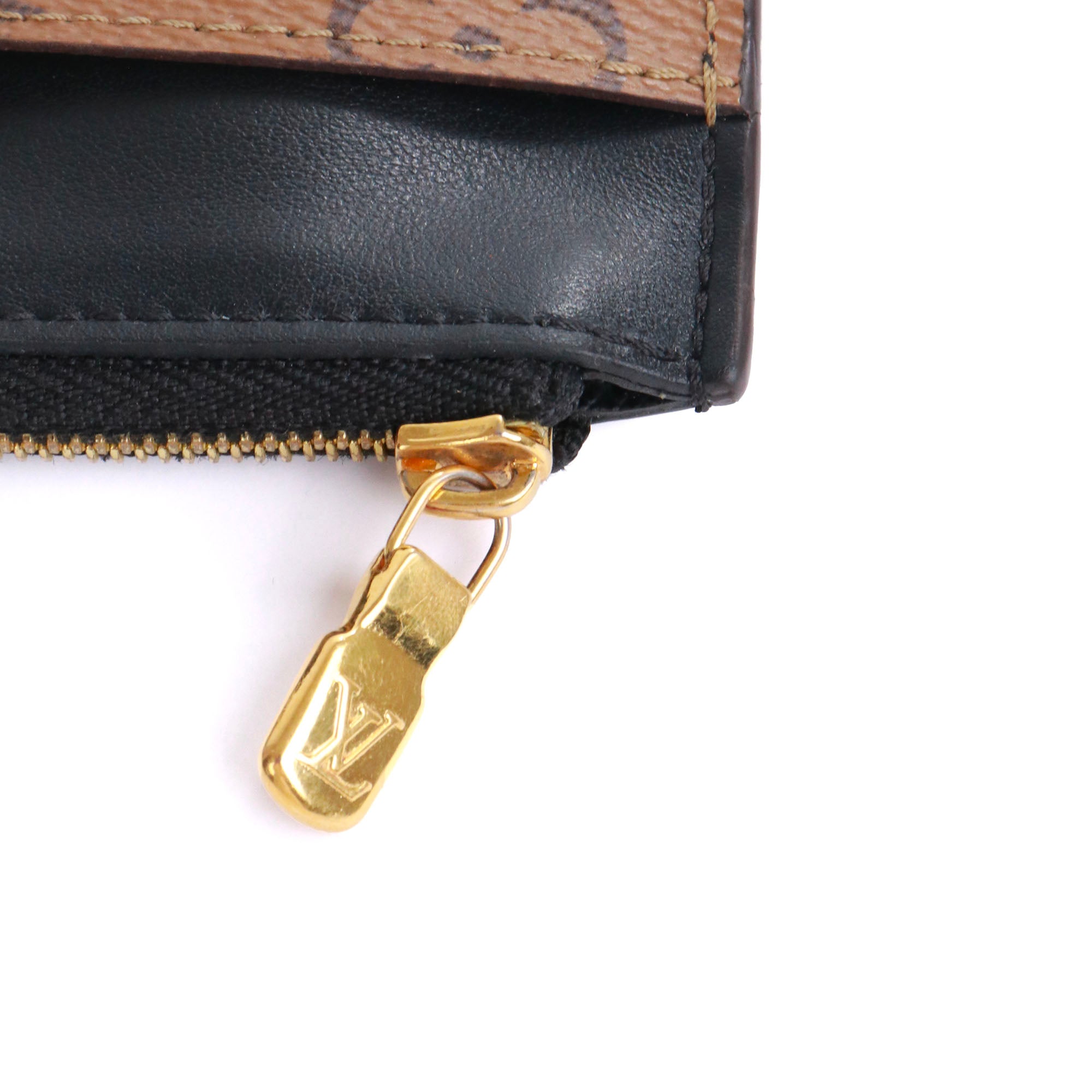 LOUIS VUITTON - Porte-monnaie et porte cartes Slim Louis Vuitton en toile monogramme reverse