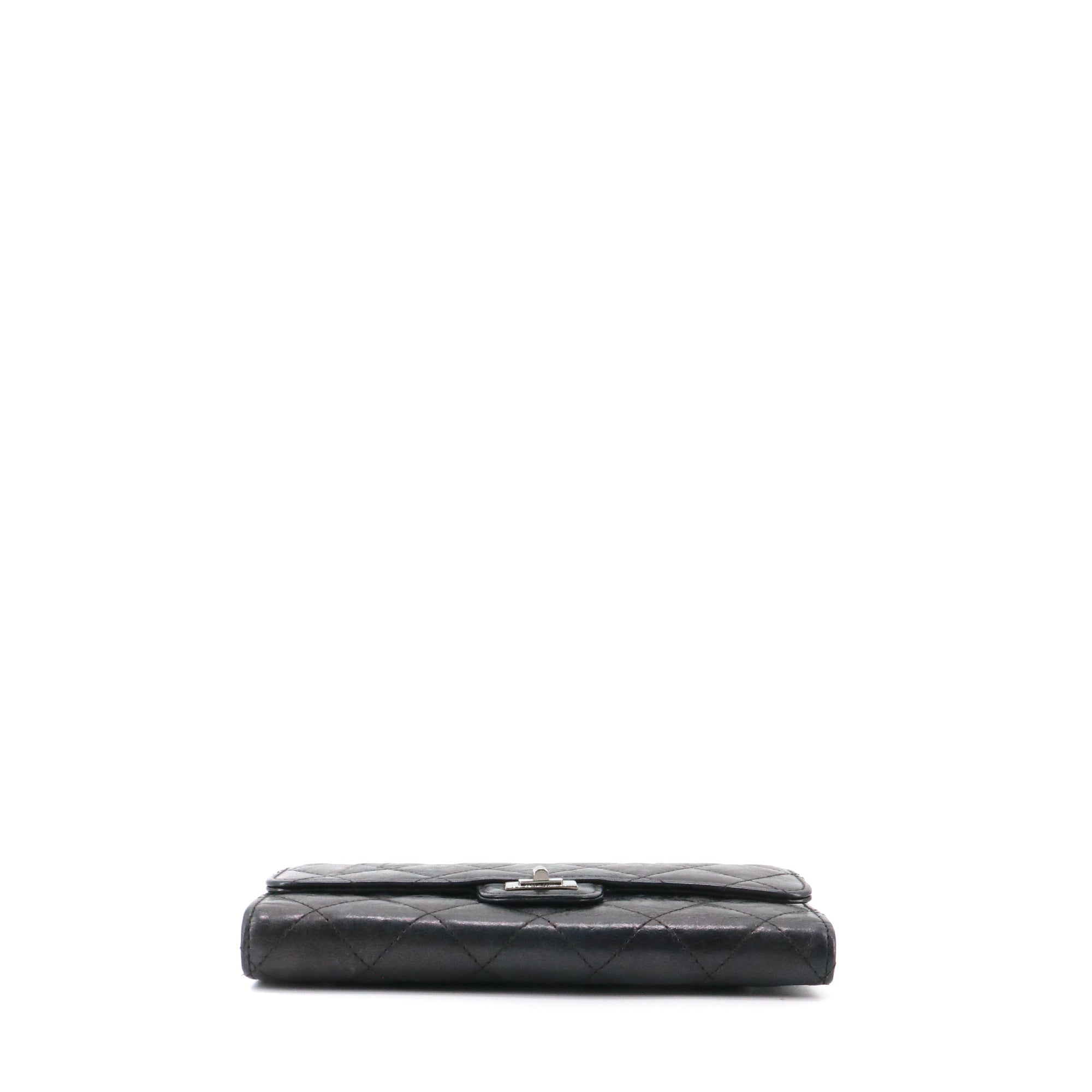 CHANEL - Black quilted leather wallet