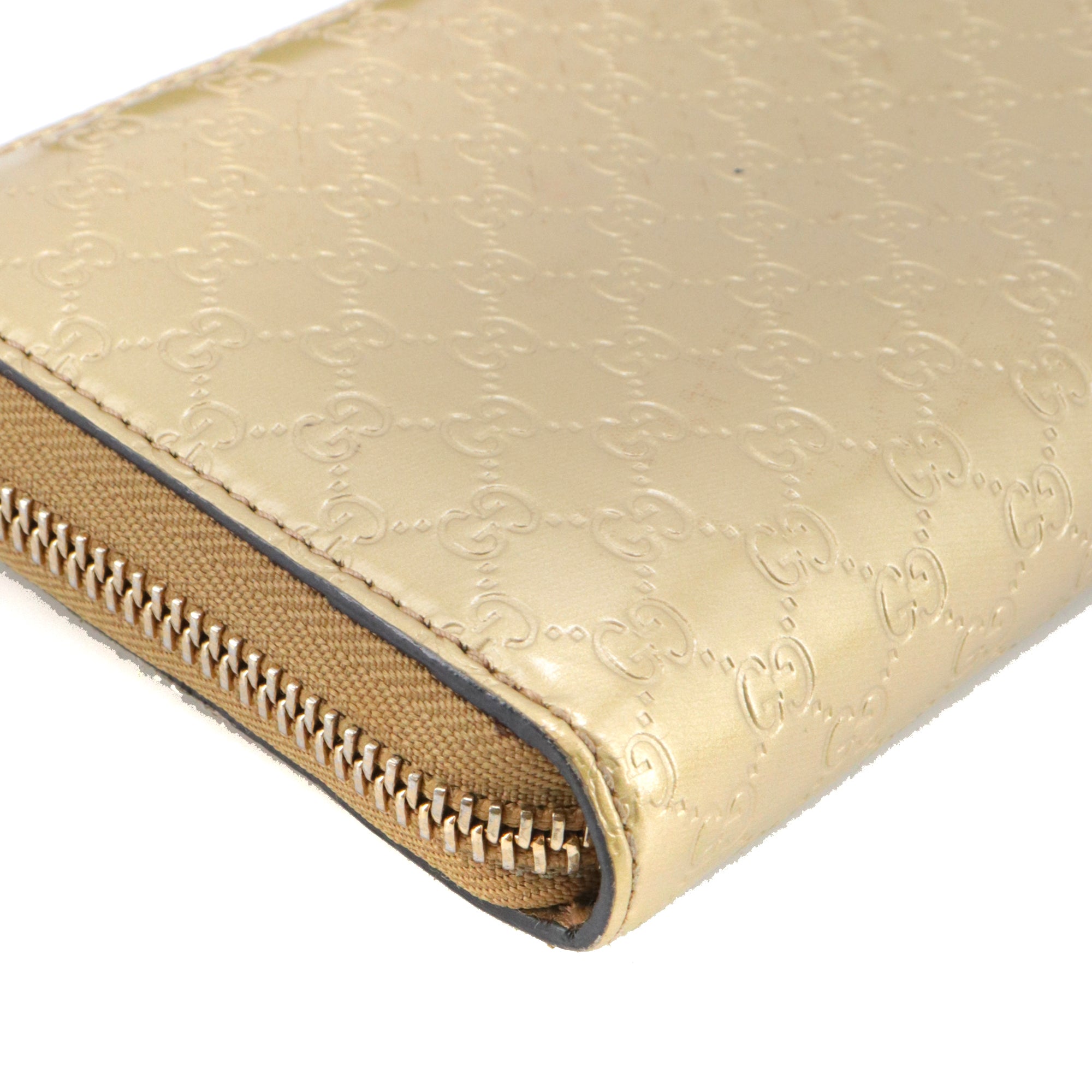 GUCCI - Grand portefeuille Gucci en cuir verni doré