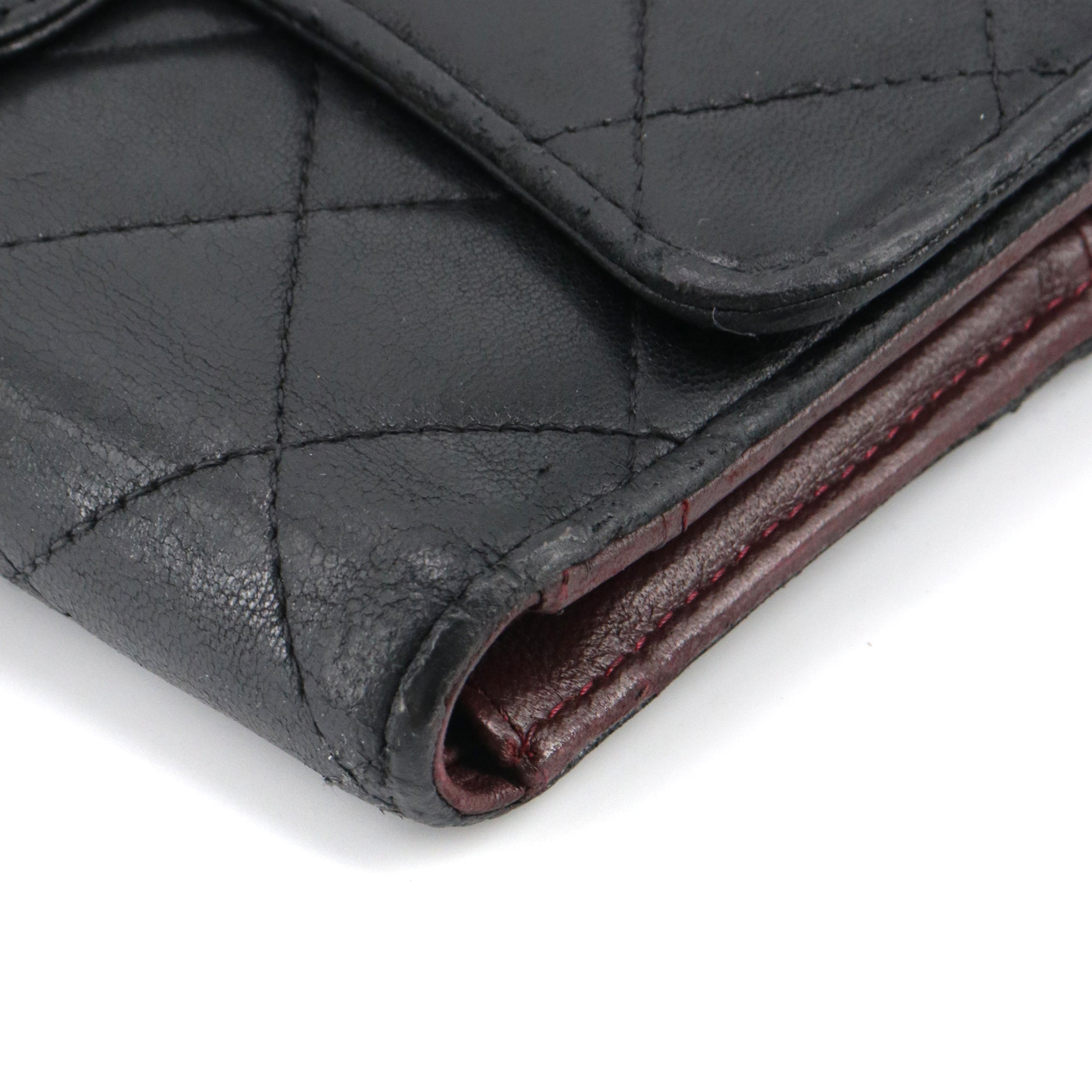 CHANEL - Black quilted leather wallet