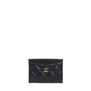 CHANEL - Porte cartes Chanel en cuir matelassé noir