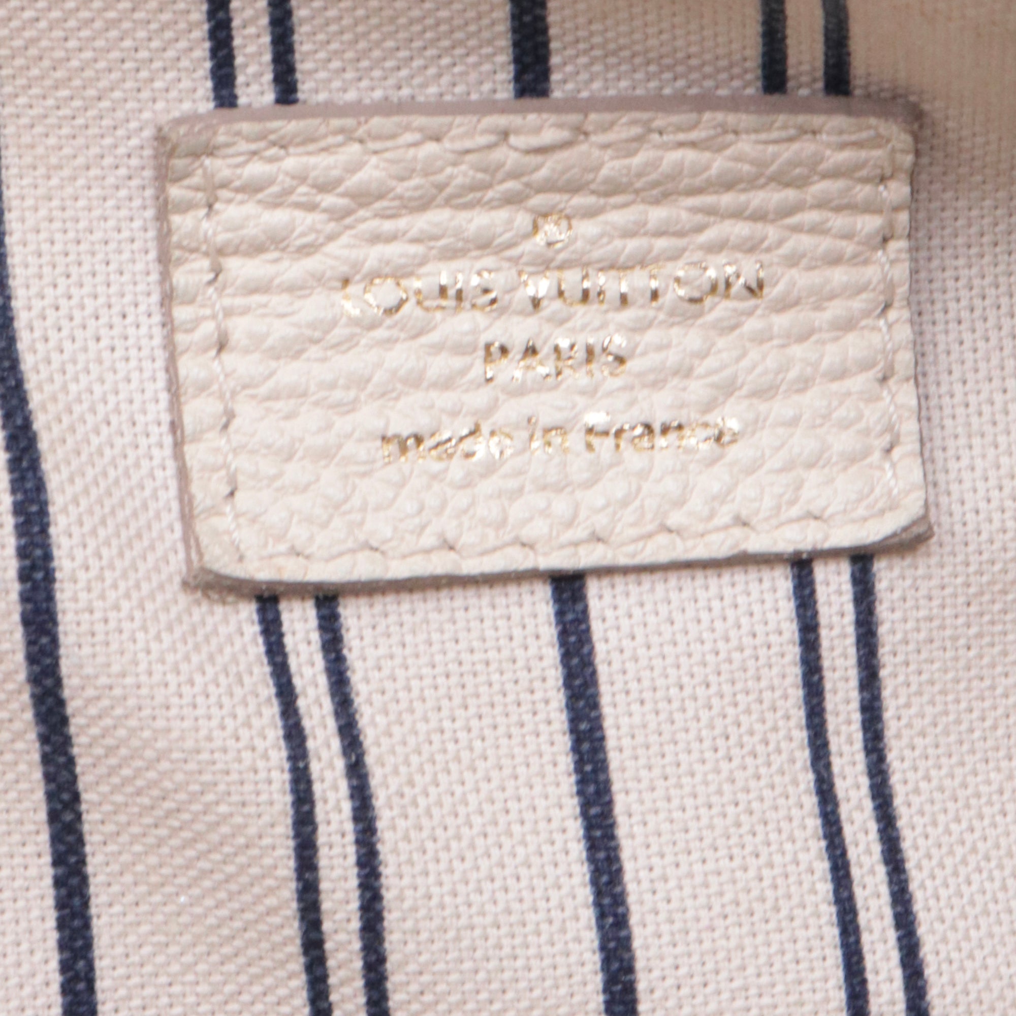 LOUIS VUITTON - Sac à main Lumineuse Louis Vuitton en cuir empreinte beige