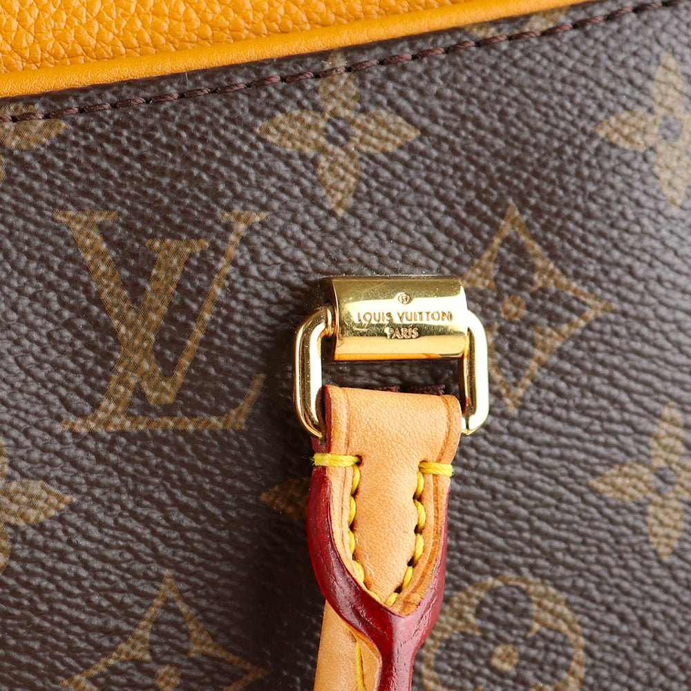 LOUIS VUITTON - Pallas handbag in monogram canvas and orange leather