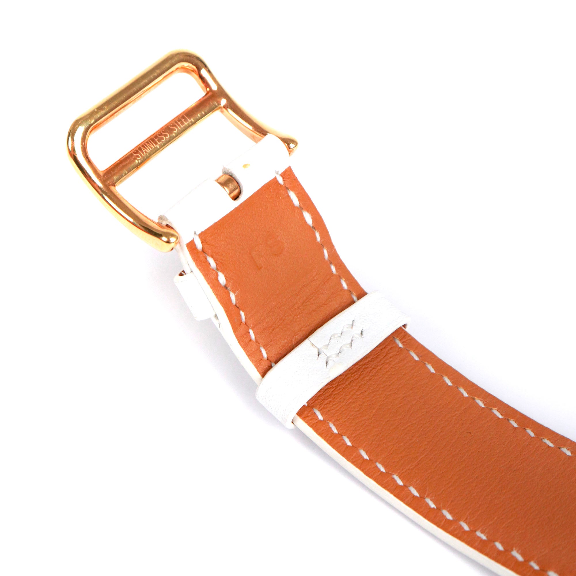 HERMÈS - Montre Heure H Hermès moyen modèle en or et cuir blanc