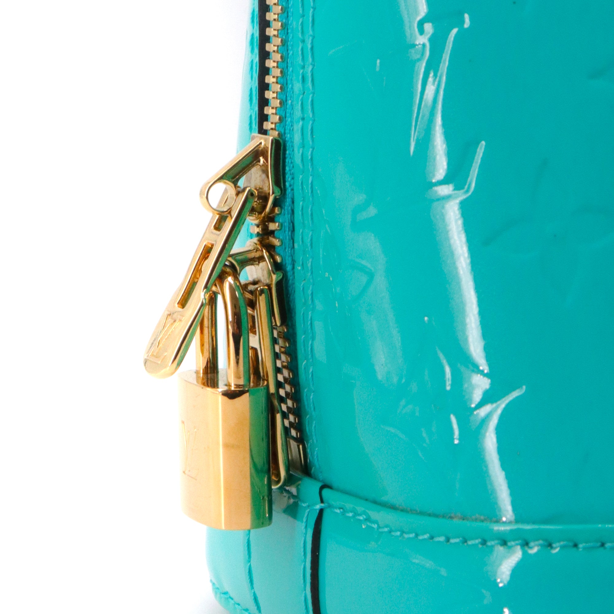 LOUIS VUITTON - Sac à main Alma PM Louis Vuitton en cuir monogrammé verni turquoise