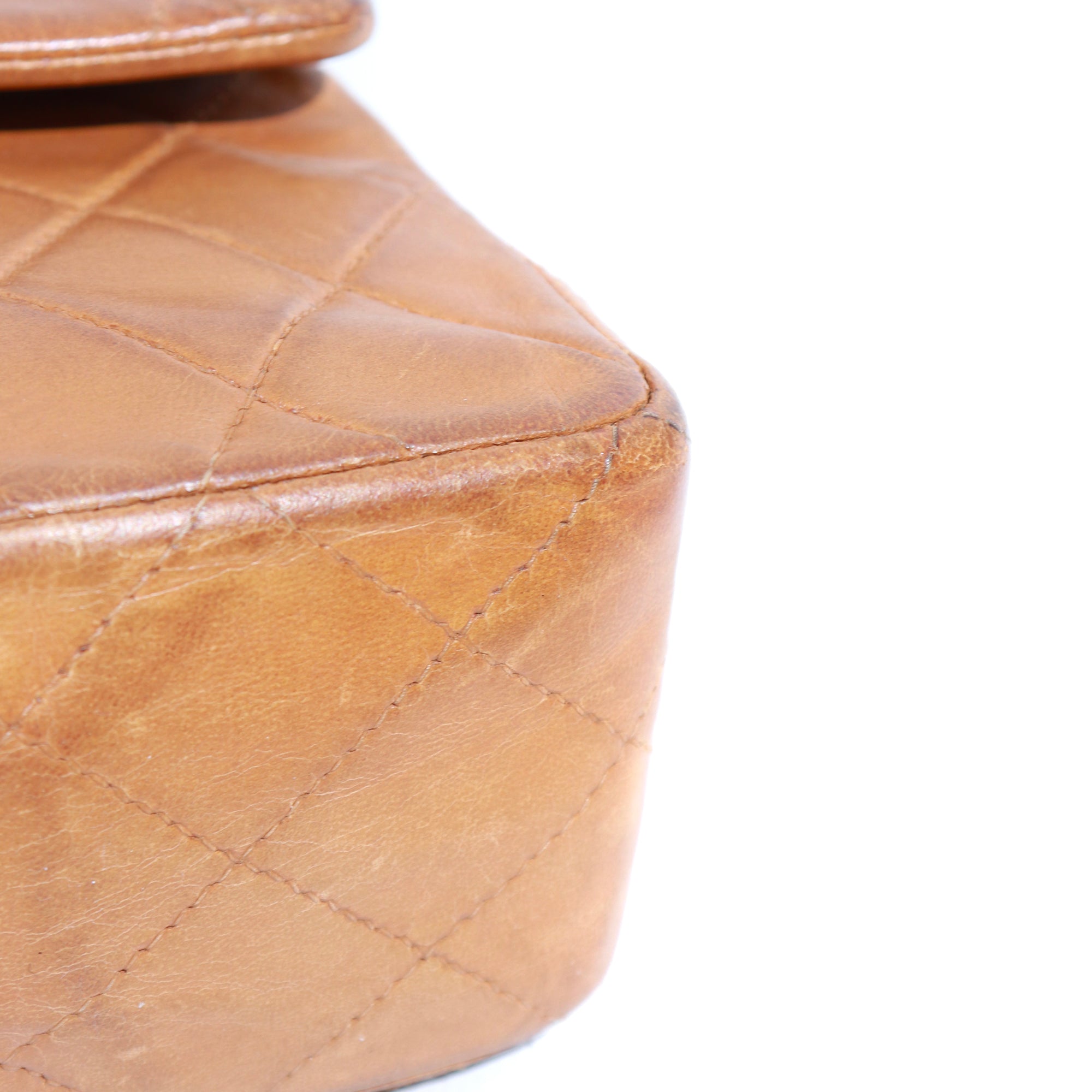 CHANEL - Sac à main Timeless 23 double flap en cuir matelassé marron