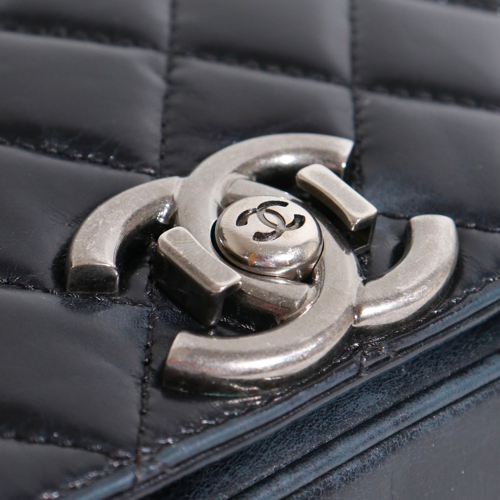 CHANEL - Coco Boy shoulder bag in black quilted leather