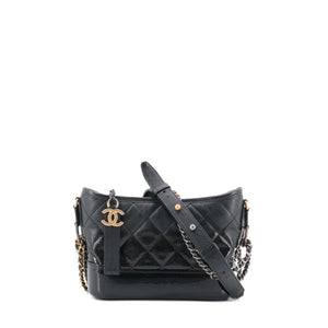 CHANEL - Chanel Gabrielle mini shoulder bag in black smooth and patent leather