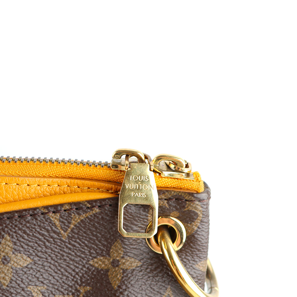 LOUIS VUITTON - Pallas handbag in monogram canvas and orange leather