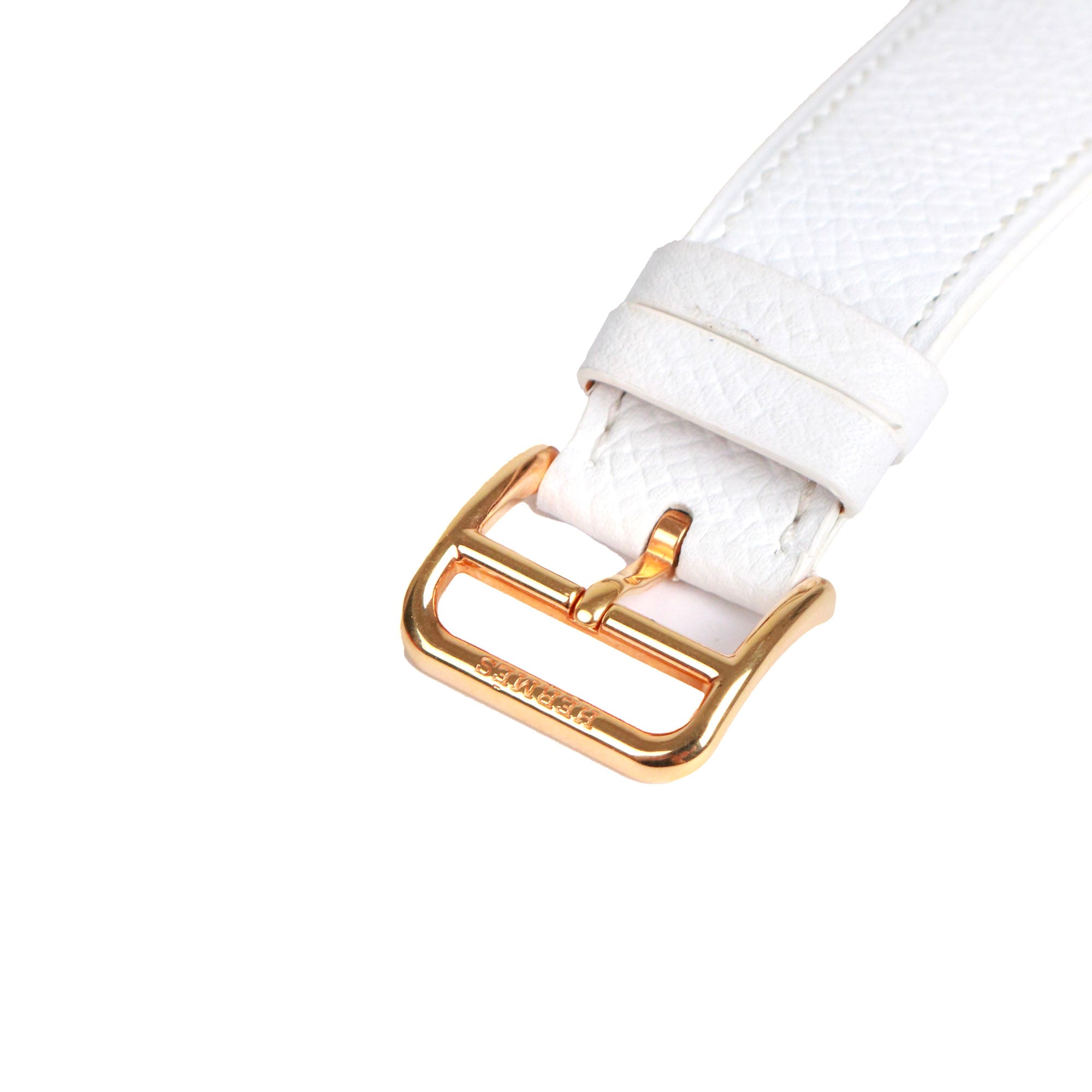 HERMÈS - Montre Heure H Hermès moyen modèle en or et cuir blanc