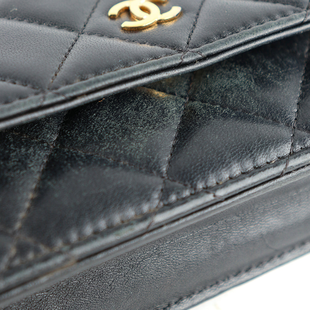 CHANEL - Sac Wallet On Chain Timeless en cuir noir