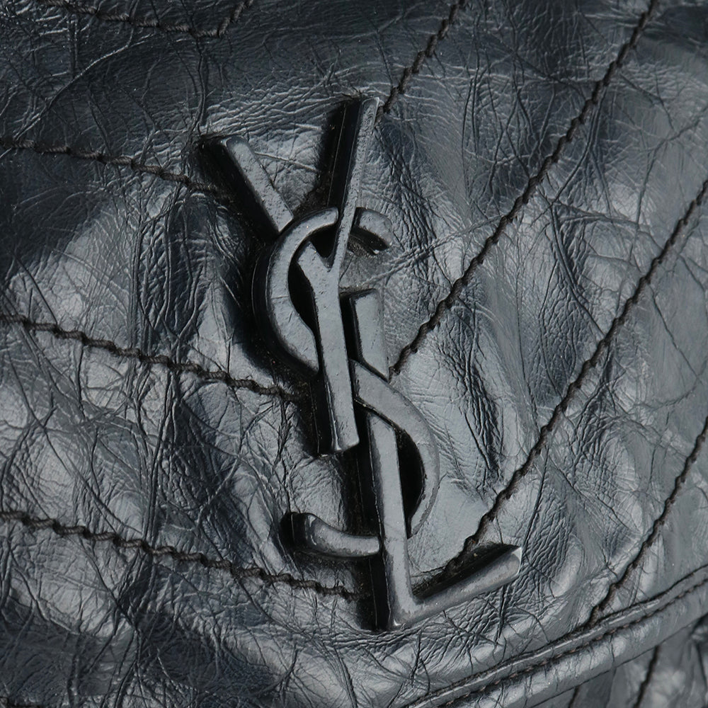 SAINT LAURENT - Sac à bandoulière Niki Medium en cuir noir