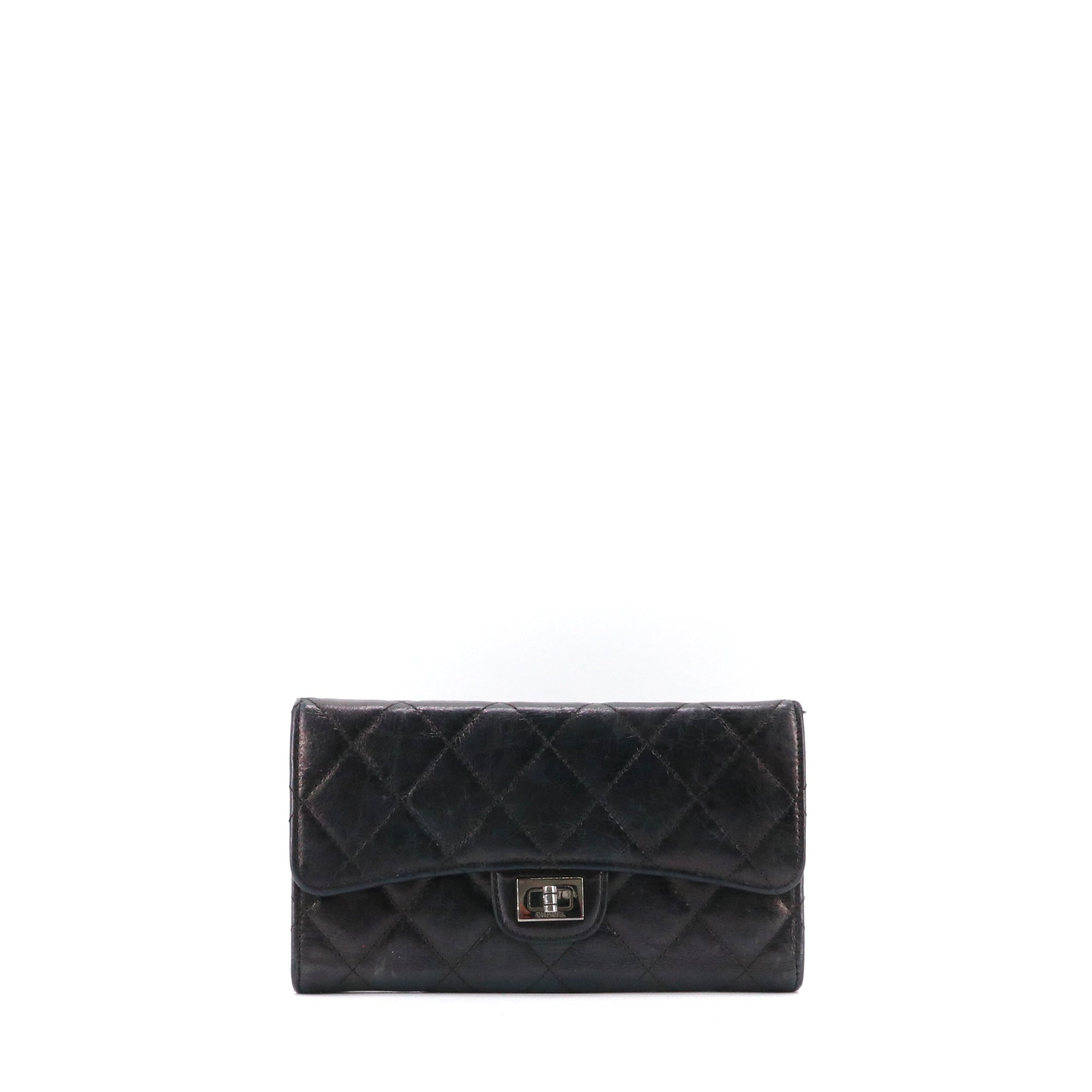 CHANEL - Black quilted leather wallet