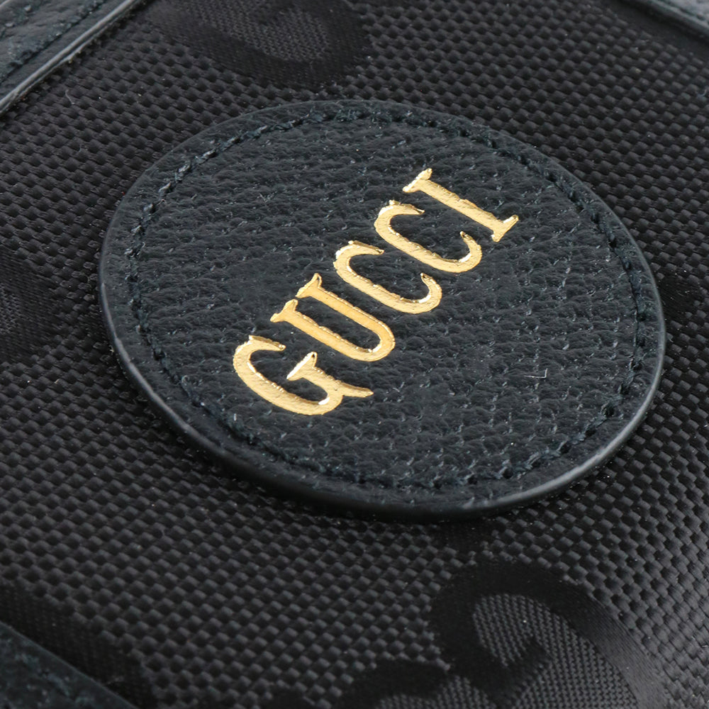 GUCCI - Portefeuille Off The Grid en cuir et toile noirs