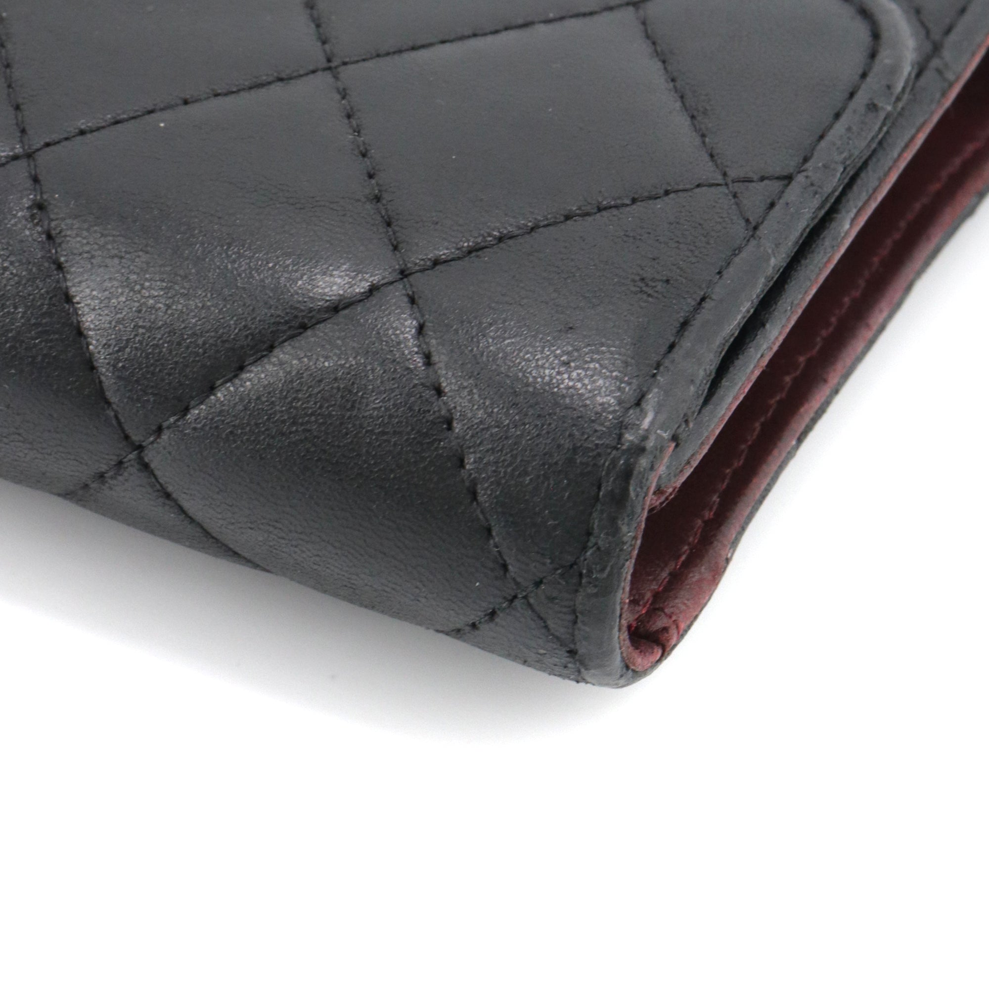 CHANEL - Black quilted leather wallet