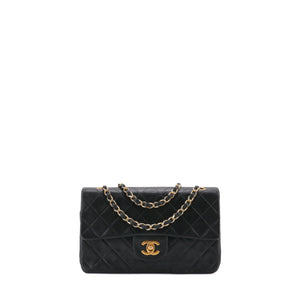 CHANEL - Sac à main Timeless 23 Chanel double flap en cuir matelassé noir