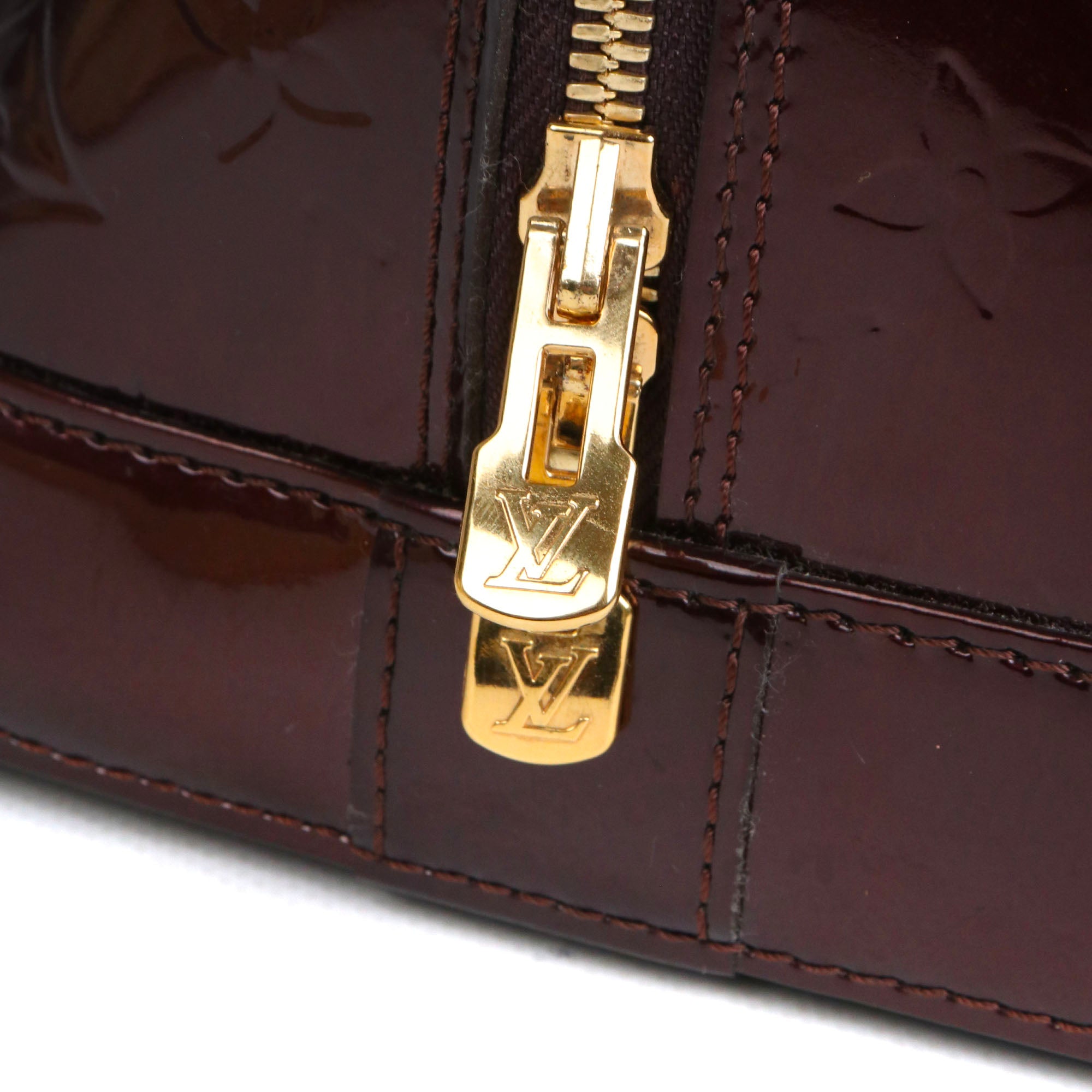 LOUIS VUITTON - Sac à main Alma PM Louis Vuitton en cuir verni bordeaux