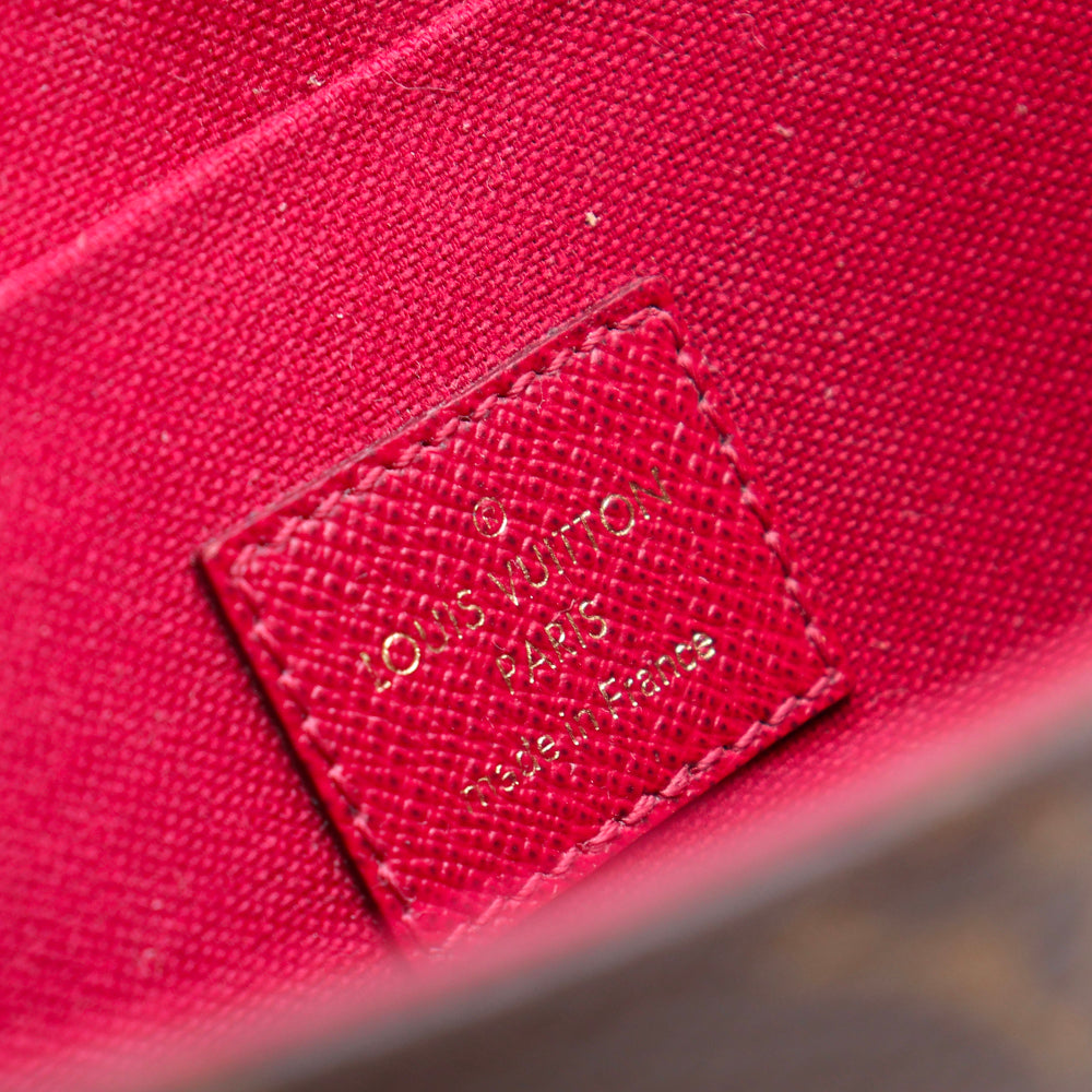 LOUIS VUITTON - Felicie clutch in monogram canvas