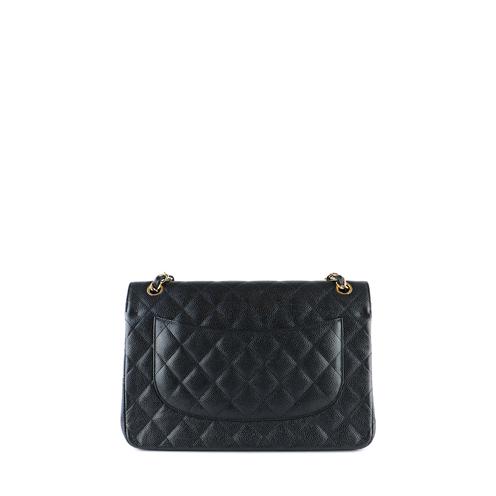 CHANEL - Sac à bandoulière Classique / Timeless Jumbo double flap en cuir caviar noir