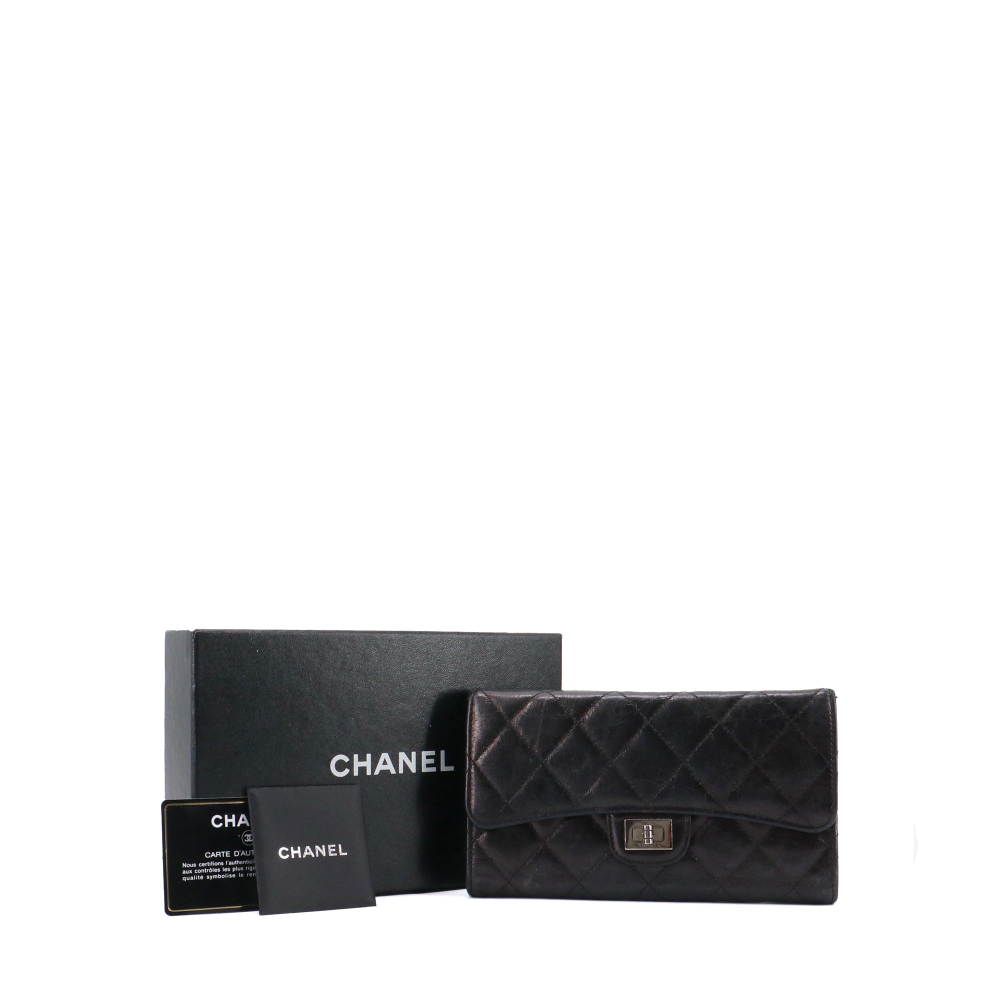 CHANEL - Black quilted leather wallet