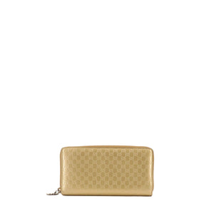 GUCCI - Grand portefeuille Gucci en cuir verni doré