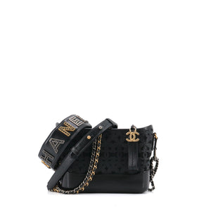 CHANEL - Chanel Limited Edition Gabrielle Mini shoulder bag in black leather and canvas
