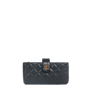 CHANEL - Mini Clutch Classique/Timeless wallet in black smooth leather