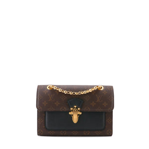 LOUIS VUITTON - Louis Vuitton Victoire shoulder bag in monogrammed canvas and black leather