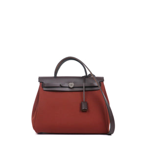 HERMÈS - Sac à bandoulière Herbag 31 Hermès en toile rouge H et ébène