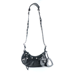 BALENCIAGA - Cagole XS rhinestone shoulder bag in black leather