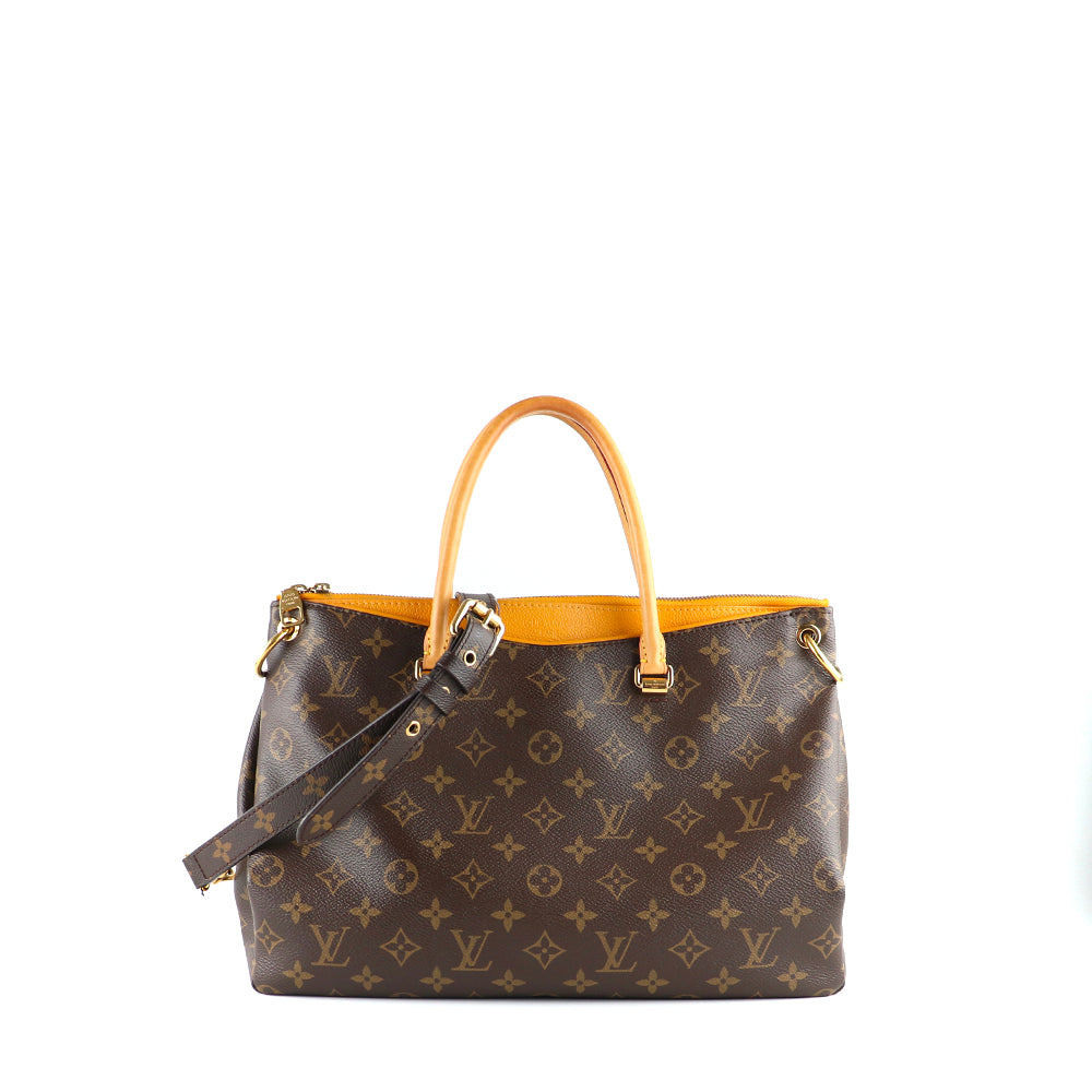 LOUIS VUITTON - Pallas handbag in monogram canvas and orange leather