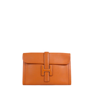 HERMÈS - Pochette Jige Hermès en cuir grainé gold
