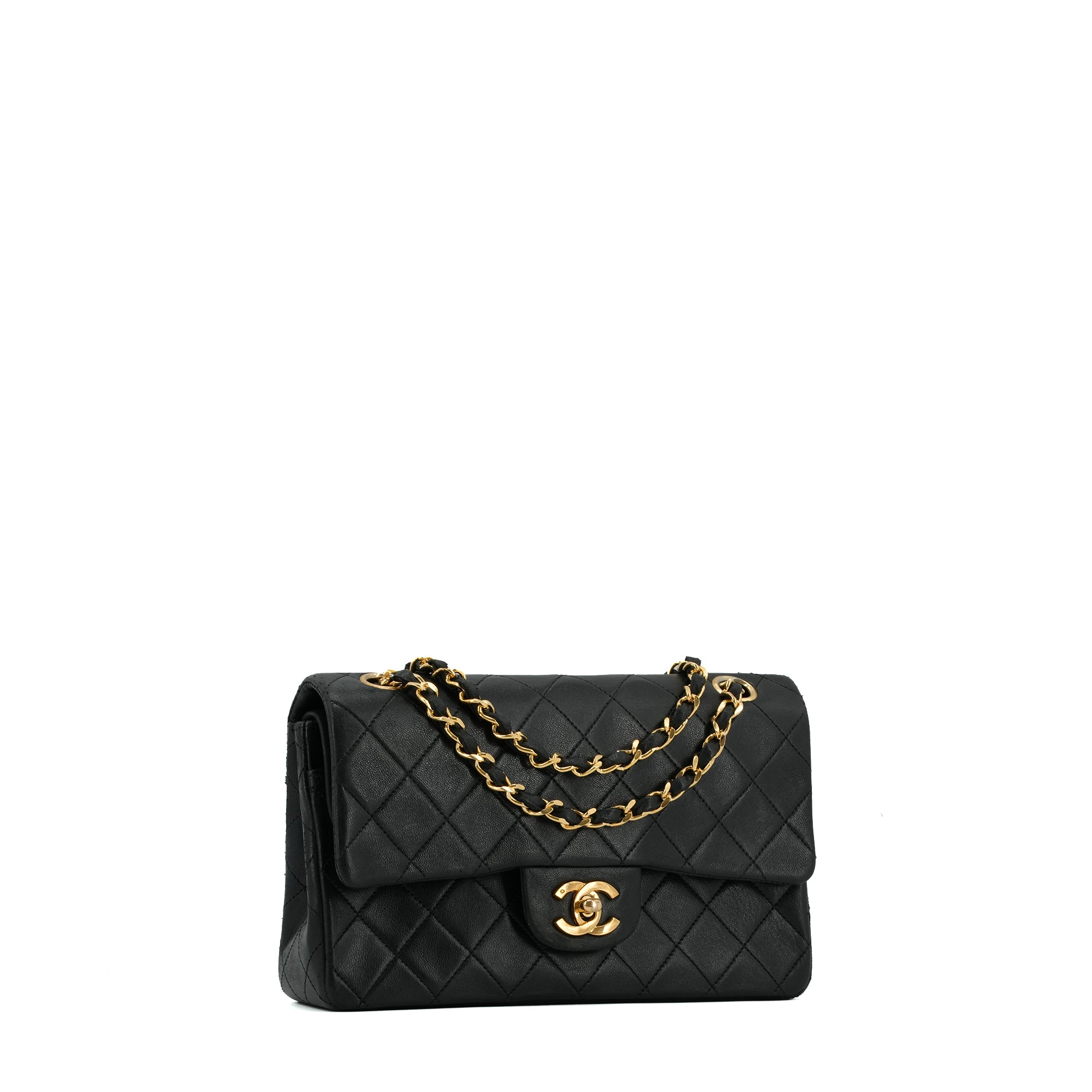 CHANEL - Sac à main Classique/Timeless small Chanel en cuir matelassé noir vintage