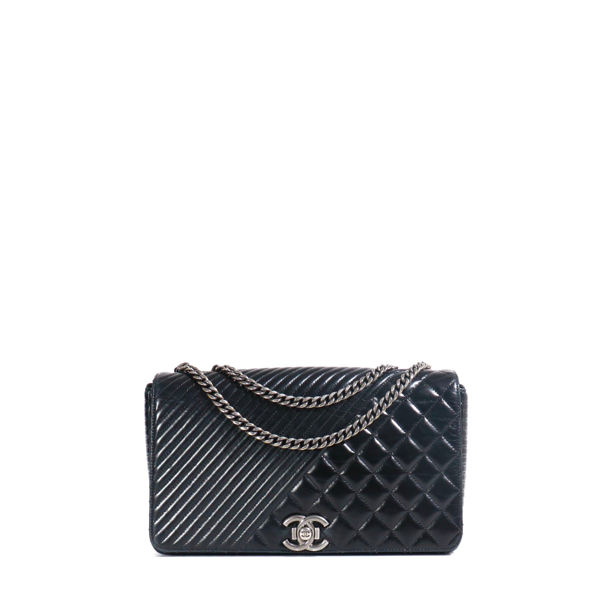 CHANEL - Coco Boy shoulder bag in black quilted leather