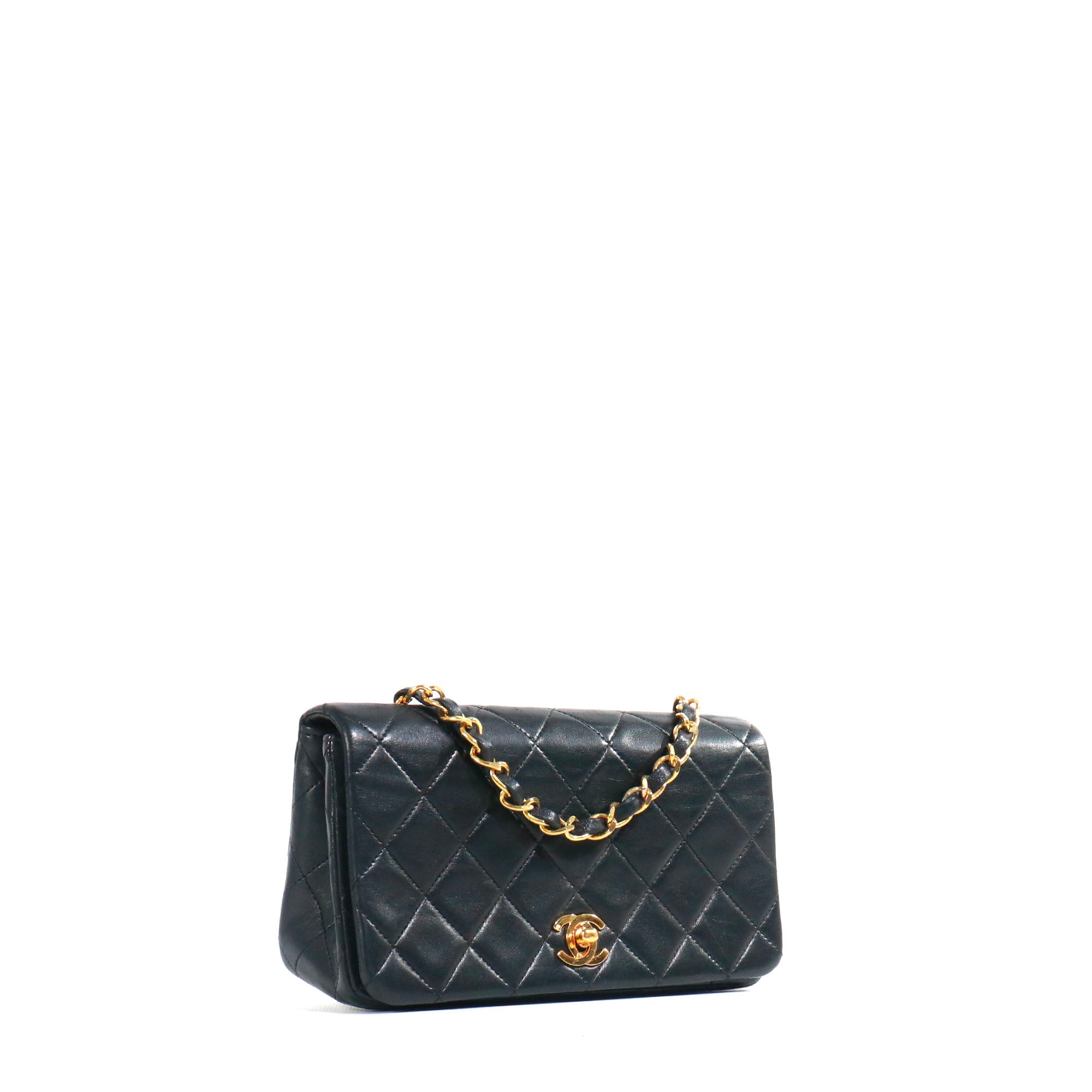 CHANEL - Sac à bandoulière Mademoiselle vintage Chanel en cuir matelassé noir