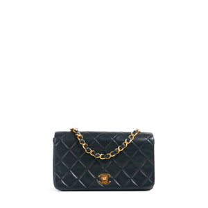 CHANEL - Sac à bandoulière Mademoiselle vintage Chanel en cuir matelassé noir