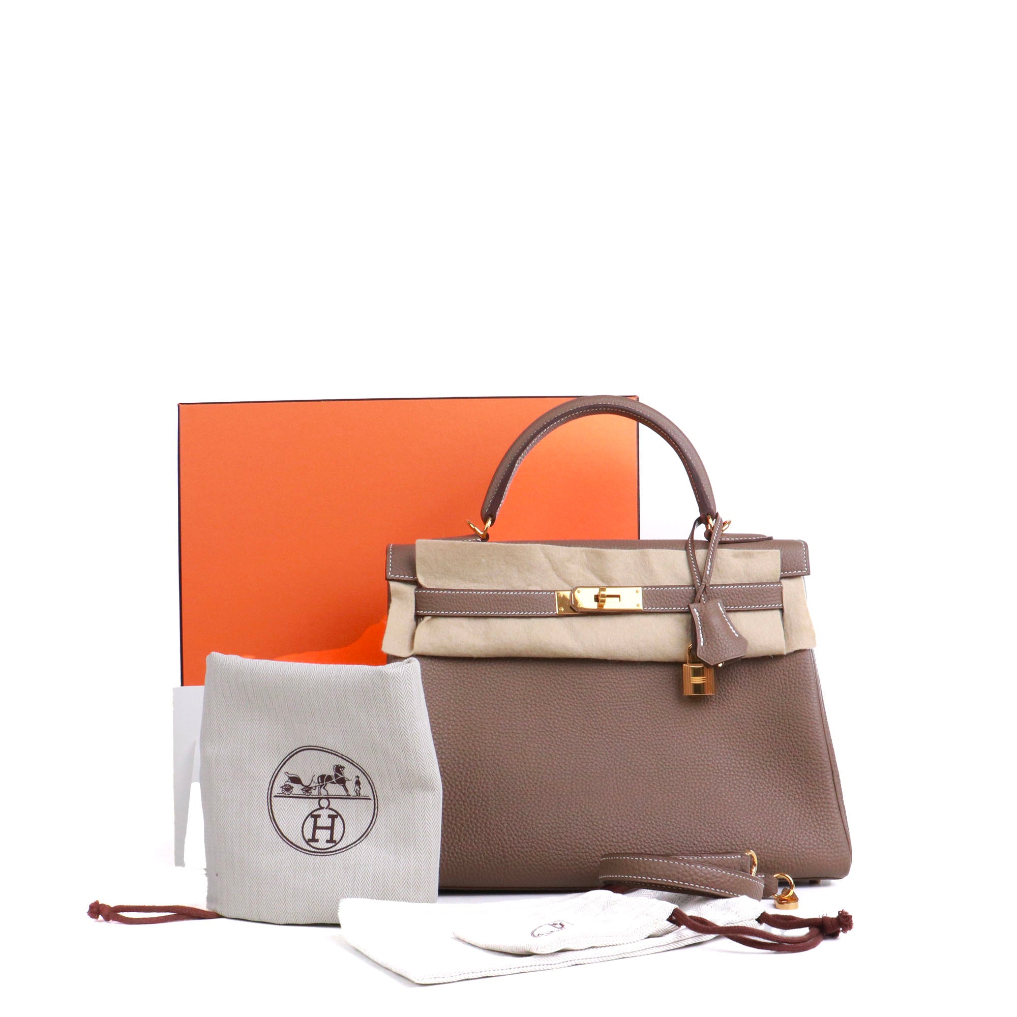 HERMÈS - Sac à main Kelly 32 Hermès en cuir togo étoupe retourné